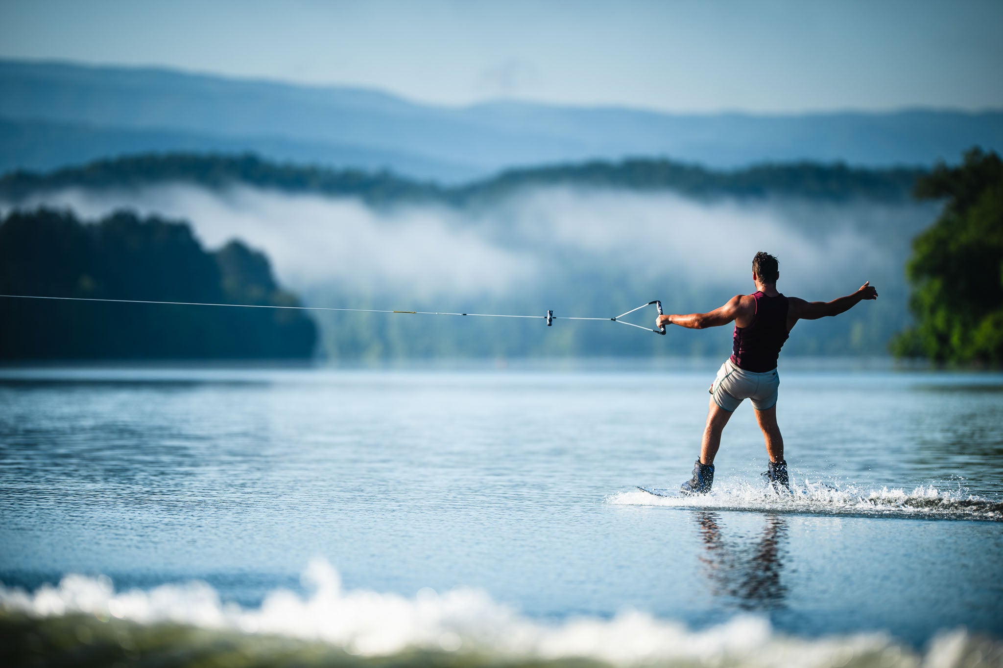 Corporate wakeboarding boat day hosted by Cory Teunissen with team on the water.