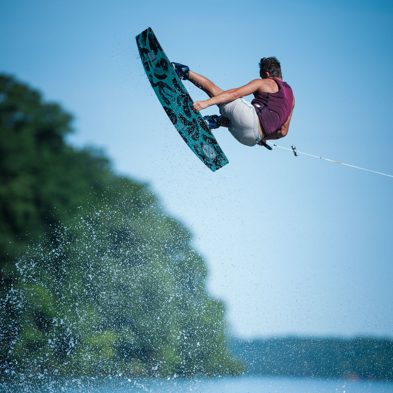 Cory Teunissen coaching wakeboarding athletes during an on water training session.